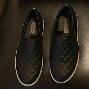 Black slip on shoes size 8 Steve Madden.